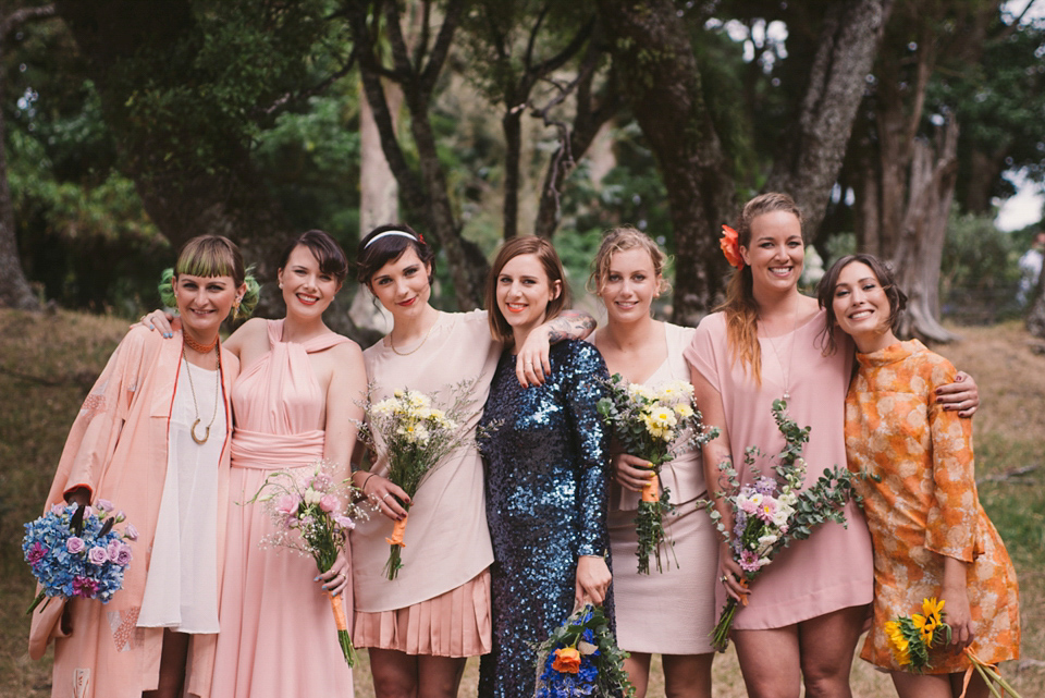 A blue sequin wedding dress for a colourful and flower filled picnic wedding. Photography by Sarah Burton.