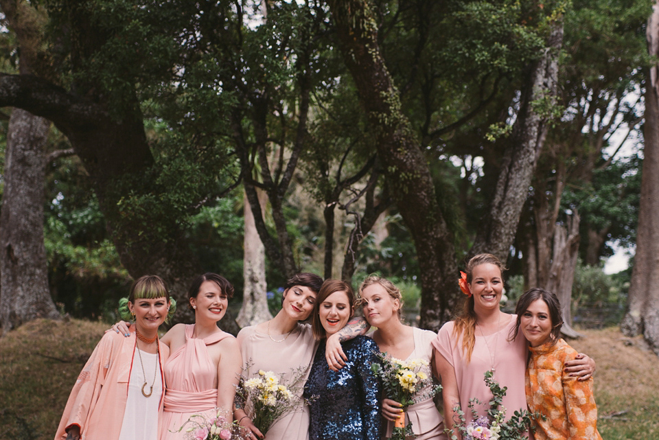 A blue sequin wedding dress for a colourful and flower filled picnic wedding. Photography by Sarah Burton.