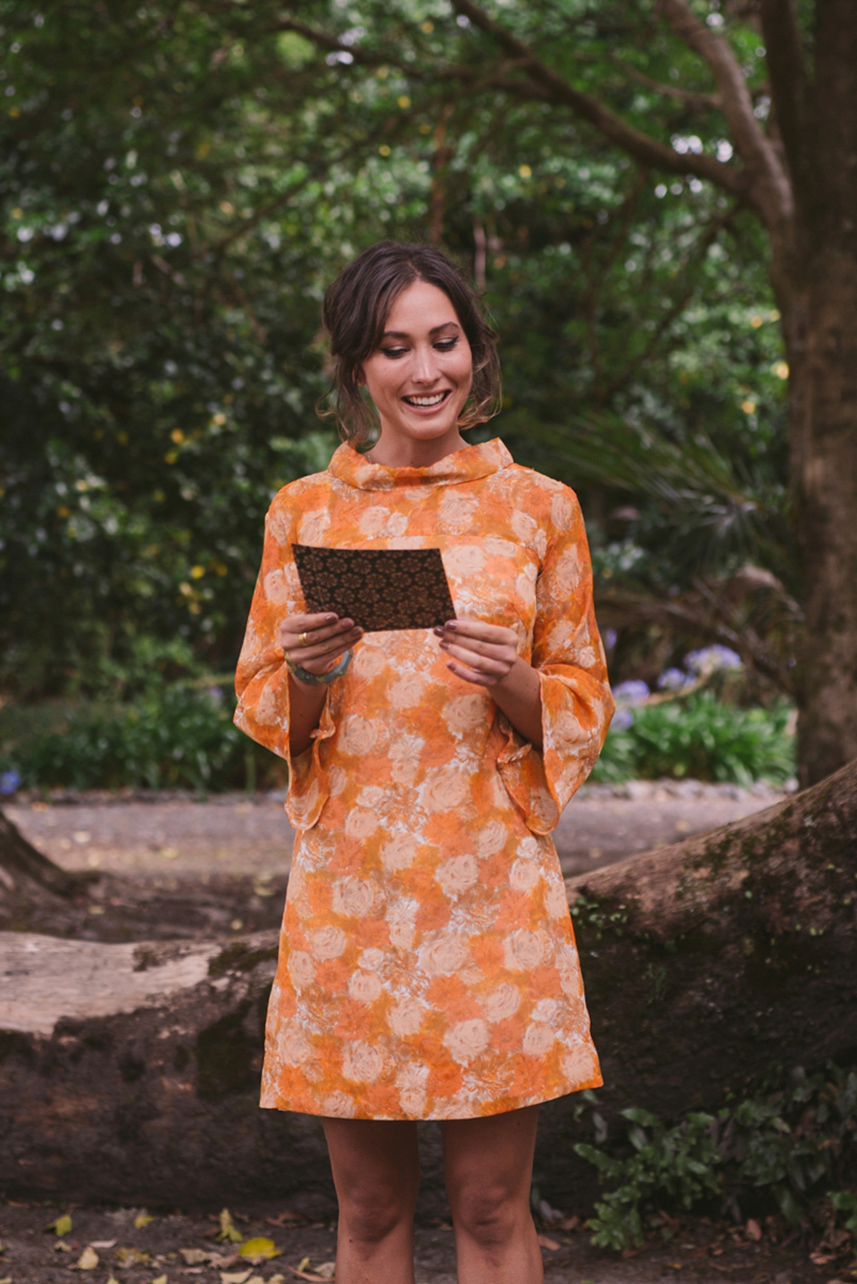 A blue sequin wedding dress for a colourful and flower filled picnic wedding. Photography by Sarah Burton.