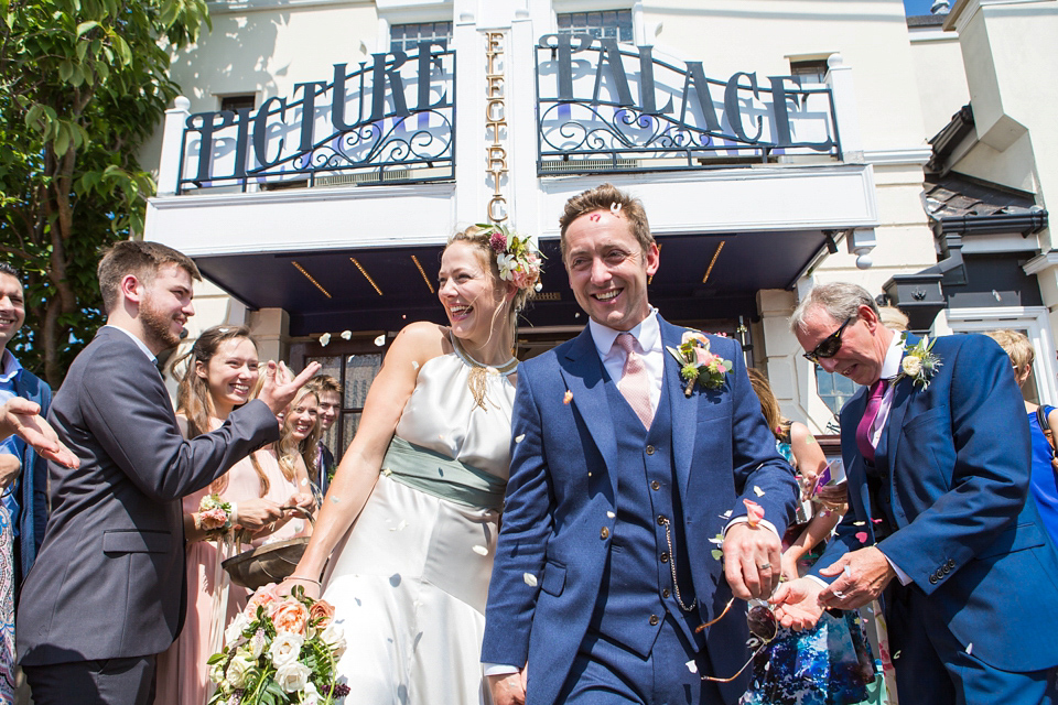 A halterneck dress for a boho bride yoga teacher and her seaside wedding. Photography by Beth Moseley. A halterneck dress for a boho bride yoga teacher and her seaside wedding. Photography by Beth Moseley.