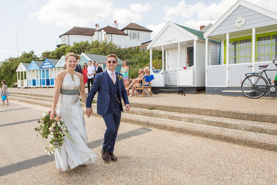 A halterneck dress for a boho bride yoga teacher and her seaside wedding. Photography by Beth Moseley. A halterneck dress for a boho bride yoga teacher and her seaside wedding. Photography by Beth Moseley.
