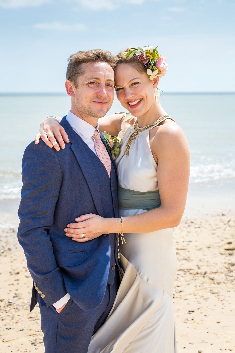 A halterneck dress for a boho bride yoga teacher and her seaside wedding. Photography by Beth Moseley. A halterneck dress for a boho bride yoga teacher and her seaside wedding. Photography by Beth Moseley.