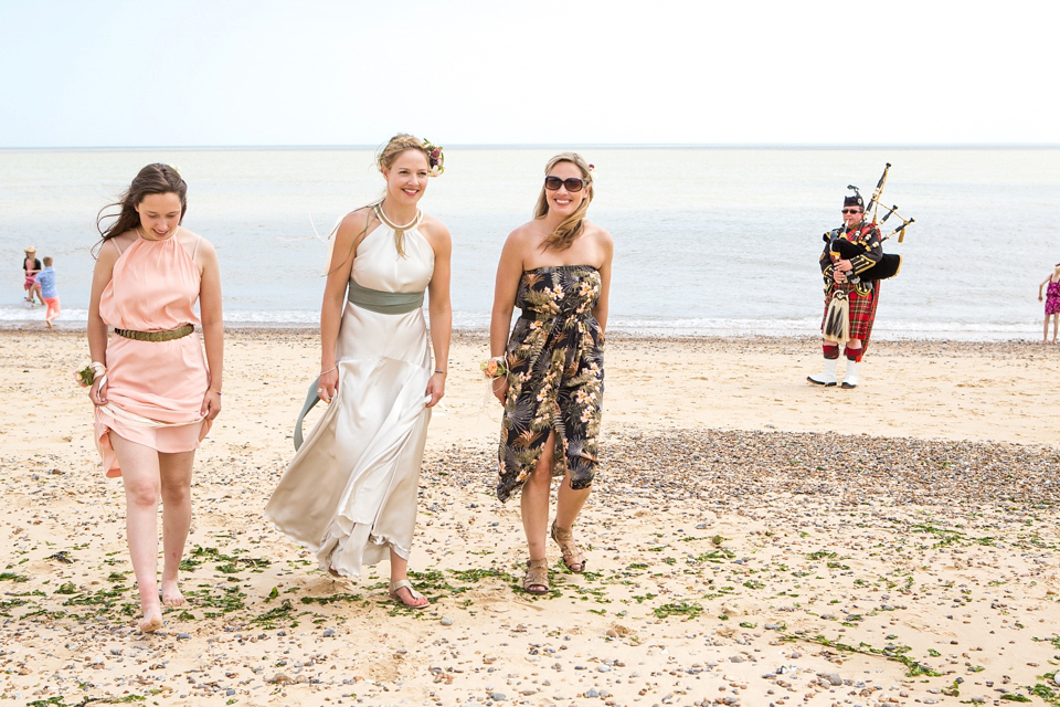 A halterneck dress for a boho bride yoga teacher and her seaside wedding. Photography by Beth Moseley. A halterneck dress for a boho bride yoga teacher and her seaside wedding. Photography by Beth Moseley.