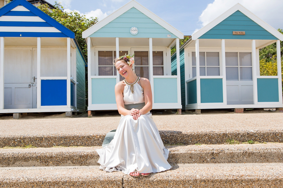 A halterneck dress for a boho bride yoga teacher and her seaside wedding. Photography by Beth Moseley. A halterneck dress for a boho bride yoga teacher and her seaside wedding. Photography by Beth Moseley.