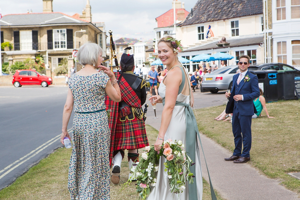 A halterneck dress for a boho bride yoga teacher and her seaside wedding. Photography by Beth Moseley. A halterneck dress for a boho bride yoga teacher and her seaside wedding. Photography by Beth Moseley.