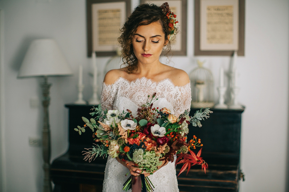 Laura wore a gown by Otilia Brailoiu for her Autumn wedding in the Romanian countryside. Images by Green Antlers Photography.