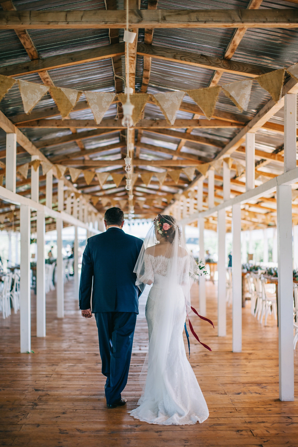 Laura wore a gown by Otilia Brailoiu for her Autumn wedding in the Romanian countryside. Images by Green Antlers Photography.