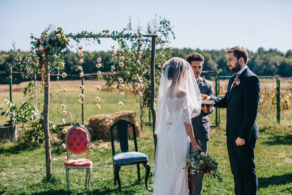 Laura wore a gown by Otilia Brailoiu for her Autumn wedding in the Romanian countryside. Images by Green Antlers Photography.