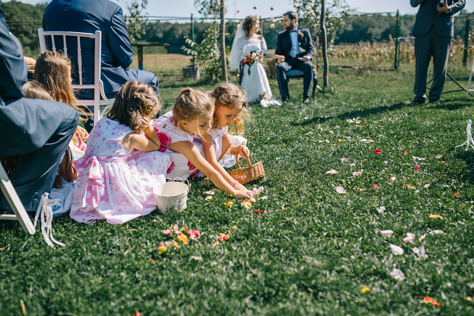 Laura wore a gown by Otilia Brailoiu for her Autumn wedding in the Romanian countryside. Images by Green Antlers Photography.