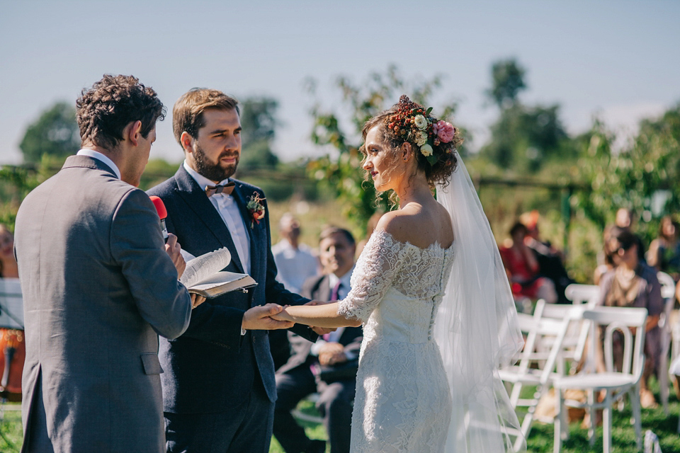 Laura wore a gown by Otilia Brailoiu for her Autumn wedding in the Romanian countryside. Images by Green Antlers Photography.