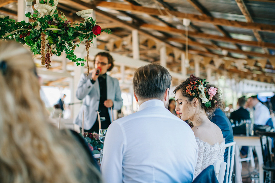 Laura wore a gown by Otilia Brailoiu for her Autumn wedding in the Romanian countryside. Images by Green Antlers Photography.