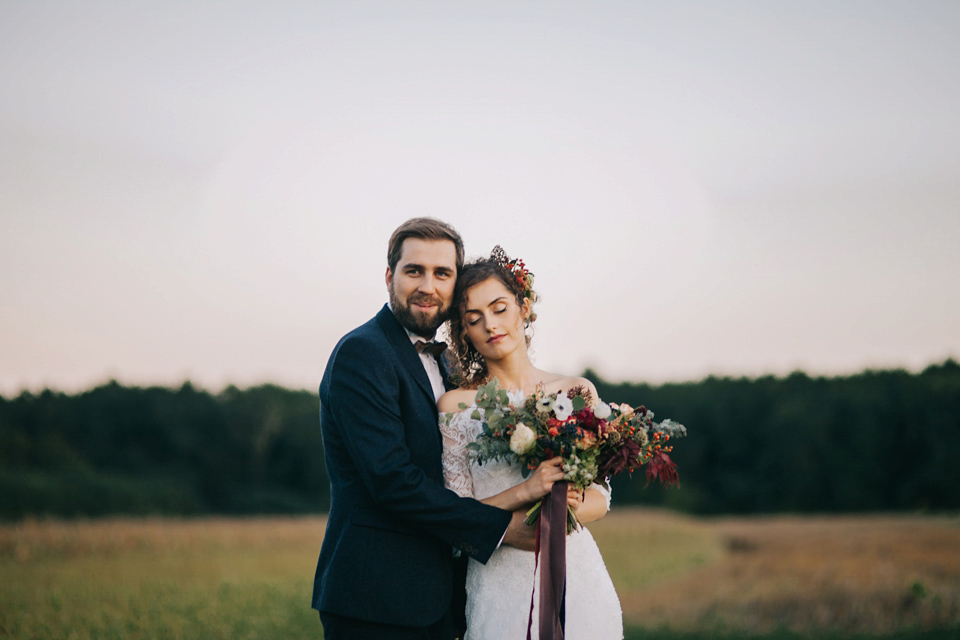 Laura wore a gown by Otilia Brailoiu for her Autumn wedding in the Romanian countryside. Images by Green Antlers Photography.