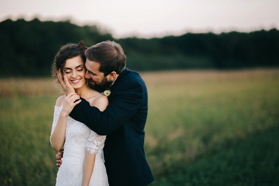 Laura wore a gown by Otilia Brailoiu for her Autumn wedding in the Romanian countryside. Images by Green Antlers Photography.