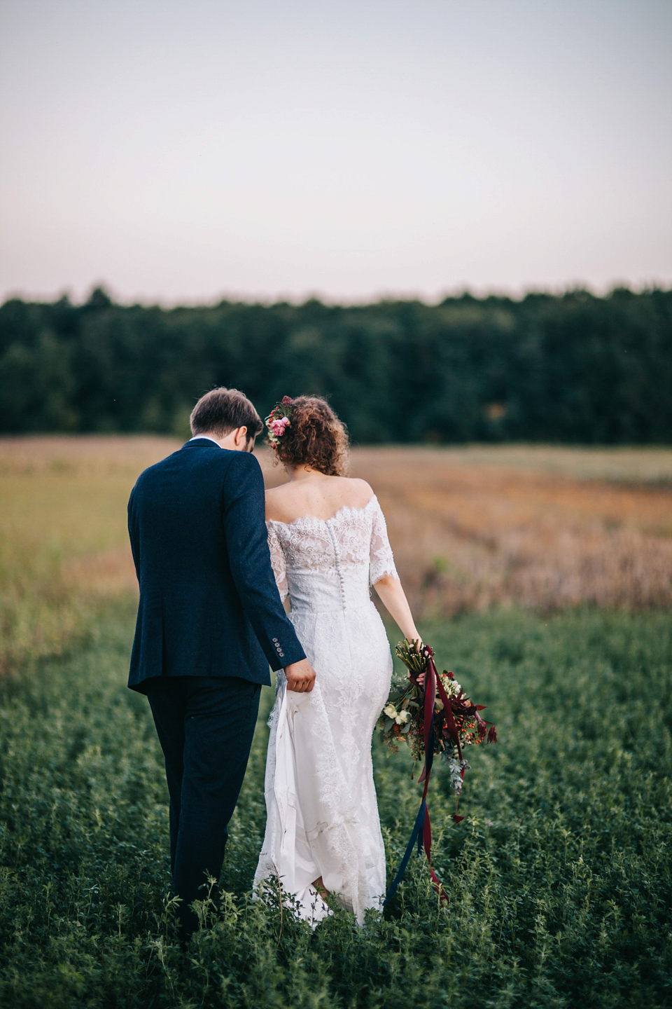 Laura wore a gown by Otilia Brailoiu for her Autumn wedding in the Romanian countryside. Images by Green Antlers Photography.