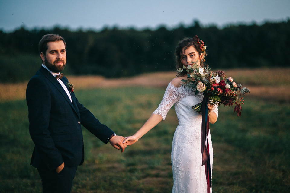 Laura wore a gown by Otilia Brailoiu for her Autumn wedding in the Romanian countryside. Images by Green Antlers Photography.