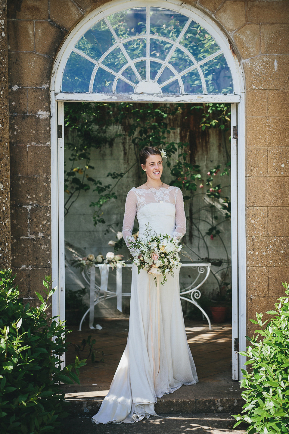 English country garden wedding elegance at Mapperton Gardens. Gowns by Belle & Bunty and floral styling by the wonderful Charlie Ryrlie of The Real Cut Flower Garden. Photography by Helen Lisk.