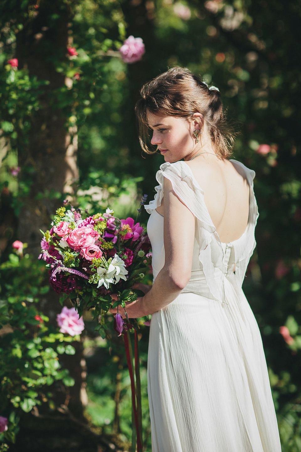 English country garden wedding elegance at Mapperton Gardens. Gowns by Belle & Bunty and floral styling by the wonderful Charlie Ryrlie of The Real Cut Flower Garden. Photography by Helen Lisk.