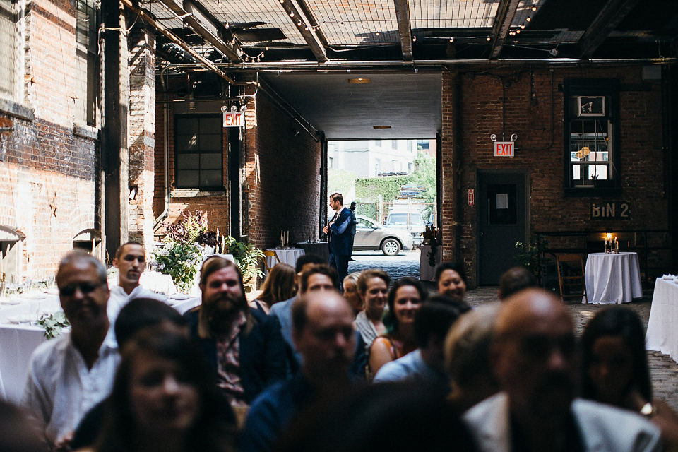 A laid back and romantic disused factory wedding in Brooklyn New York. Bride Maris wore a Nicole Miller gown via BHLDN. Photoggraphy by Jean-Laurent Gaudy.