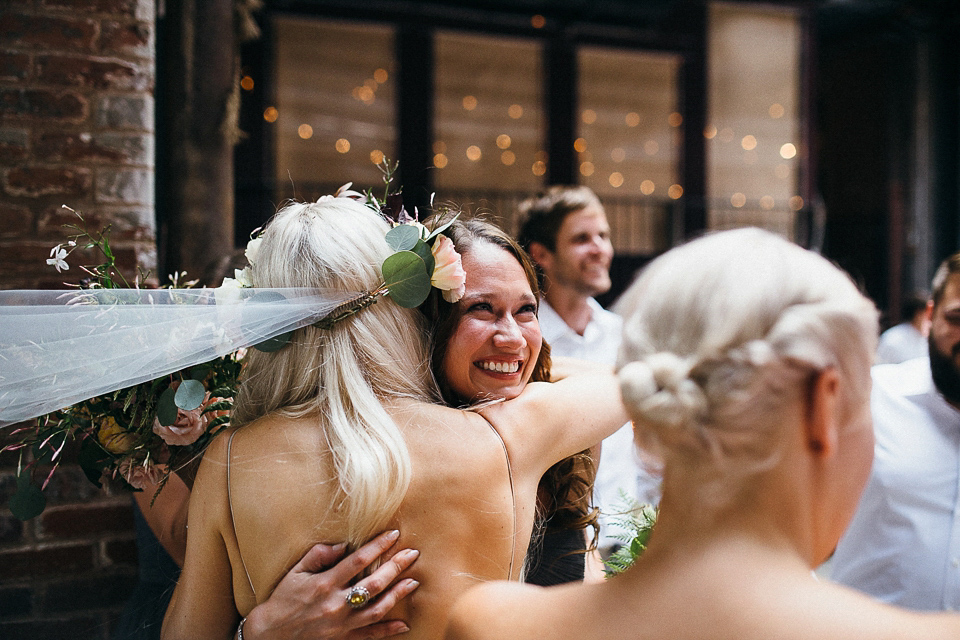 A laid back and romantic disused factory wedding in Brooklyn New York. Bride Maris wore a Nicole Miller gown via BHLDN. Photoggraphy by Jean-Laurent Gaudy.