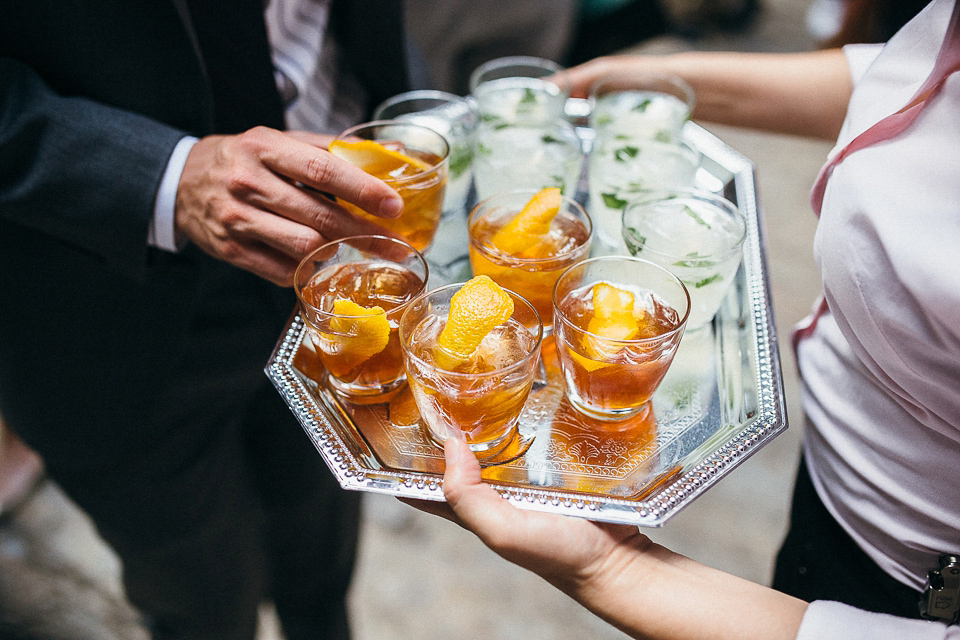 A laid back and romantic disused factory wedding in Brooklyn New York. Bride Maris wore a Nicole Miller gown via BHLDN. Photoggraphy by Jean-Laurent Gaudy.