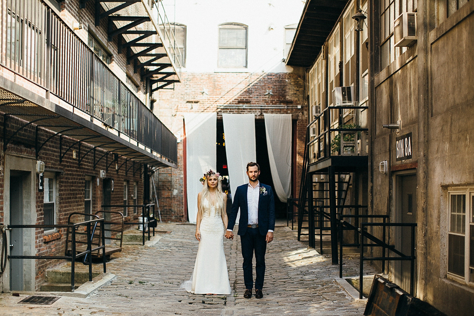 A laid back and romantic disused factory wedding in Brooklyn New York. Bride Maris wore a Nicole Miller gown via BHLDN. Photoggraphy by Jean-Laurent Gaudy.