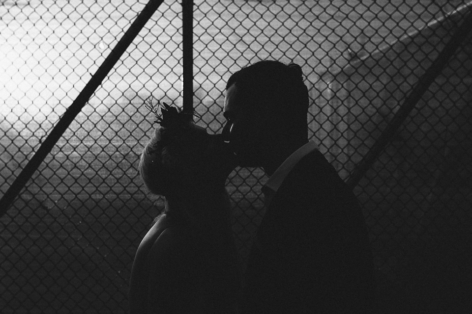 A laid back and romantic disused factory wedding in Brooklyn New York. Bride Maris wore a Nicole Miller gown via BHLDN. Photoggraphy by Jean-Laurent Gaudy.