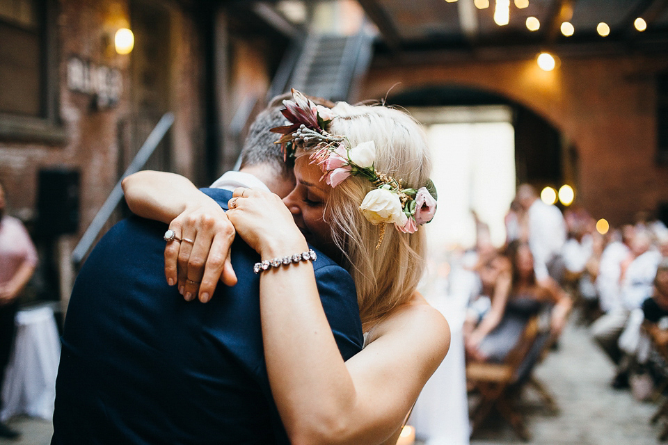 A laid back and romantic disused factory wedding in Brooklyn New York. Bride Maris wore a Nicole Miller gown via BHLDN. Photoggraphy by Jean-Laurent Gaudy.