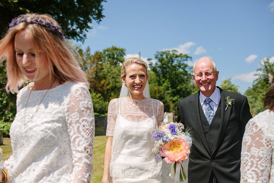 Bride Sarah wears a dropped waist gown by Stephanie Allin for her English country garden wedding. Photography by Joanna Brown.