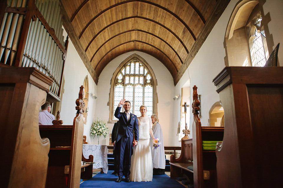 Bride Sarah wears a dropped waist gown by Stephanie Allin for her English country garden wedding. Photography by Joanna Brown.