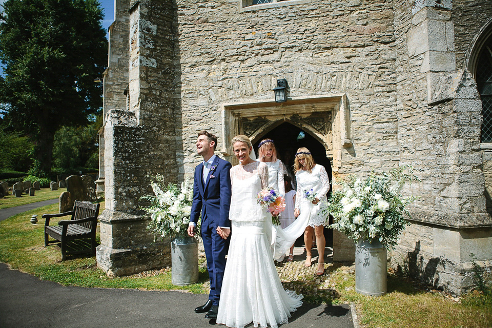 Bride Sarah wears a dropped waist gown by Stephanie Allin for her English country garden wedding. Photography by Joanna Brown.