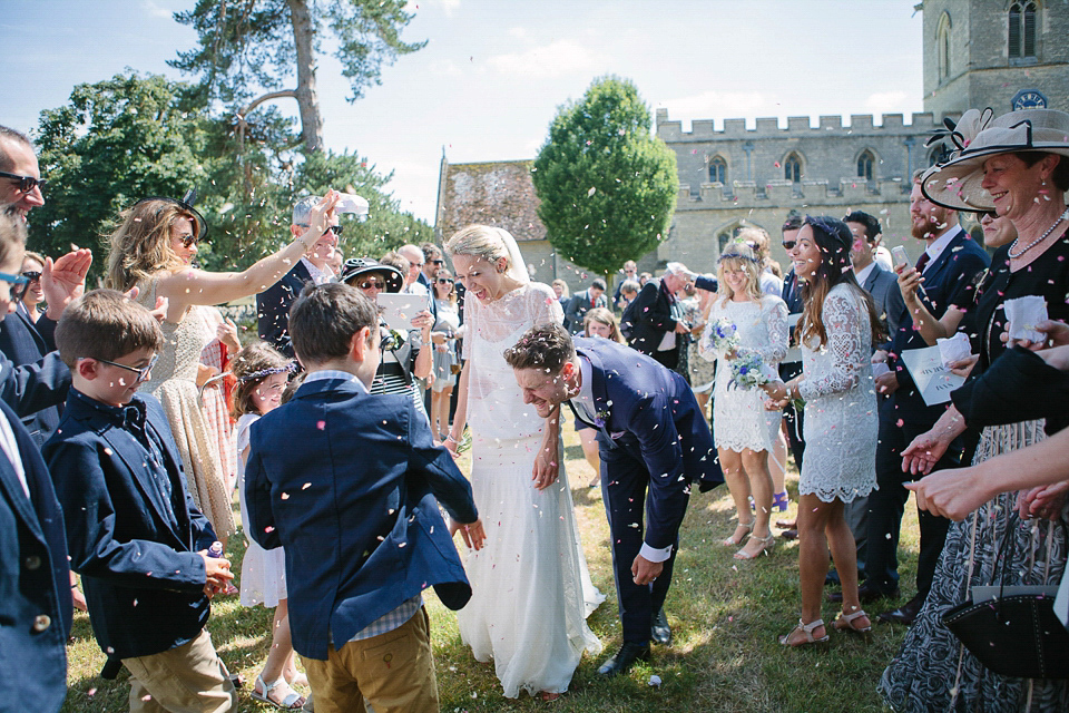 Bride Sarah wears a dropped waist gown by Stephanie Allin for her English country garden wedding. Photography by Joanna Brown.