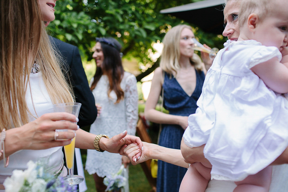 Bride Sarah wears a dropped waist gown by Stephanie Allin for her English country garden wedding. Photography by Joanna Brown.