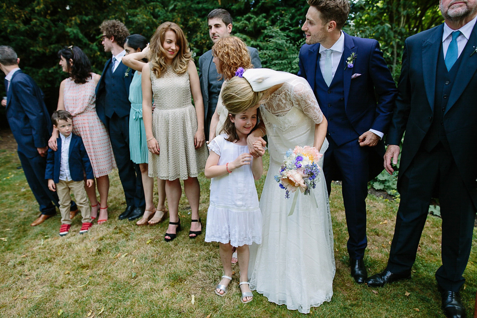 Bride Sarah wears a dropped waist gown by Stephanie Allin for her English country garden wedding. Photography by Joanna Brown.