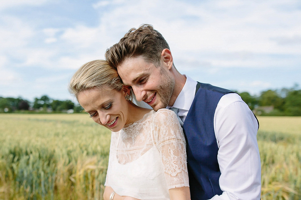 Bride Sarah wears a dropped waist gown by Stephanie Allin for her English country garden wedding. Photography by Joanna Brown.