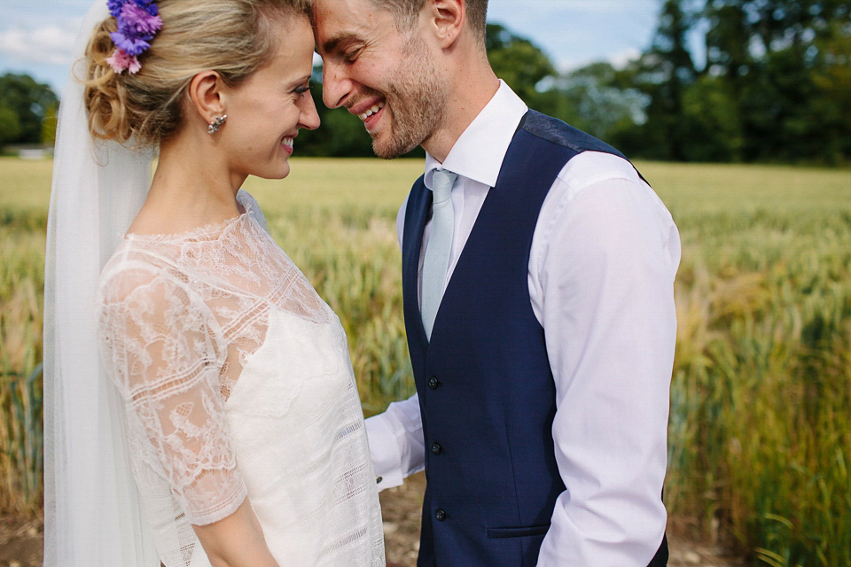 Bride Sarah wears a dropped waist gown by Stephanie Allin for her English country garden wedding. Photography by Joanna Brown.