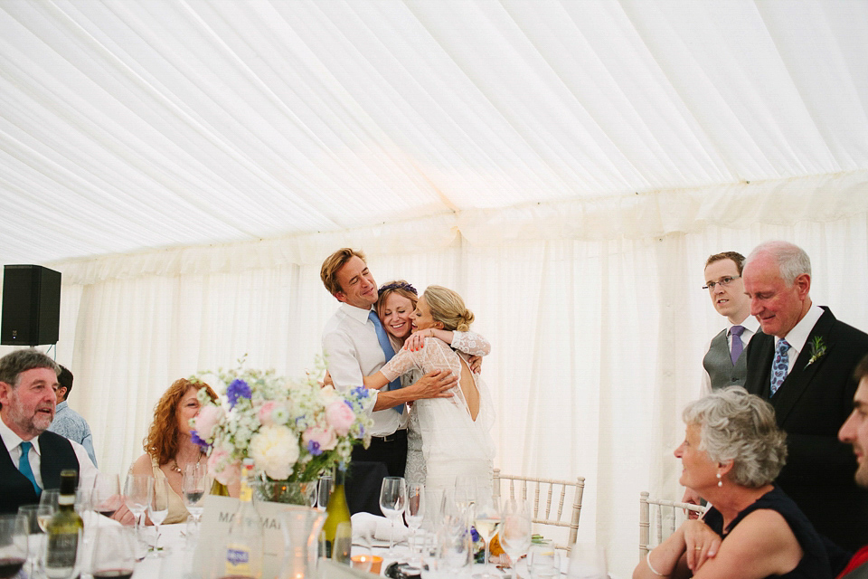 Bride Sarah wears a dropped waist gown by Stephanie Allin for her English country garden wedding. Photography by Joanna Brown.