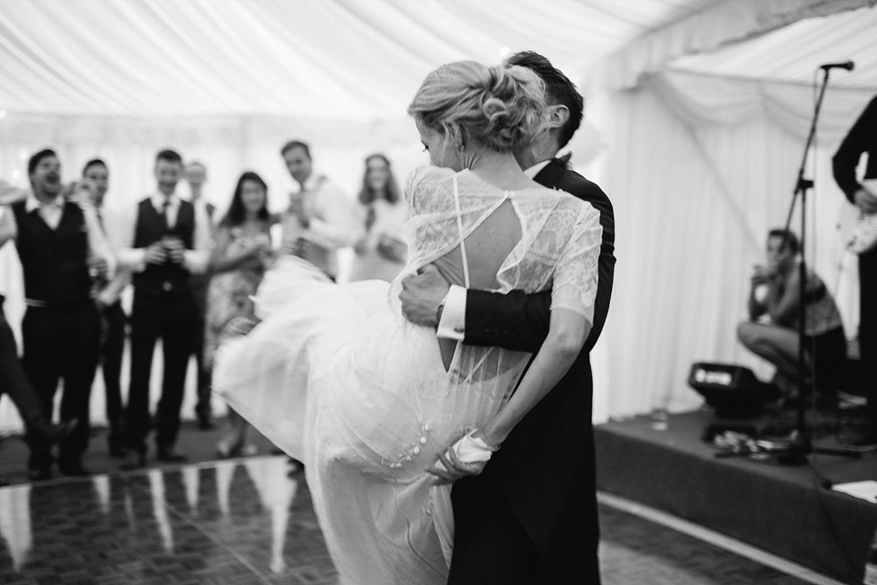 Bride Sarah wears a dropped waist gown by Stephanie Allin for her English country garden wedding. Photography by Joanna Brown.