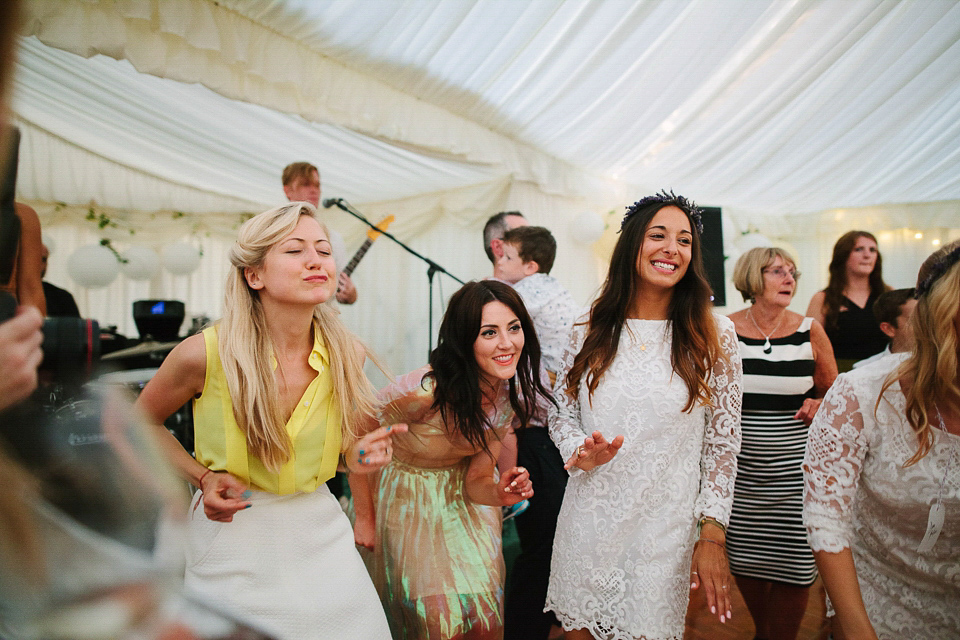 Bride Sarah wears a dropped waist gown by Stephanie Allin for her English country garden wedding. Photography by Joanna Brown.