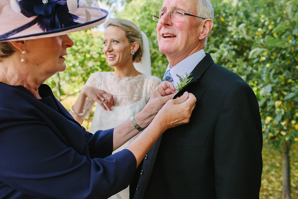 Bride Sarah wears a dropped waist gown by Stephanie Allin for her English country garden wedding. Photography by Joanna Brown.