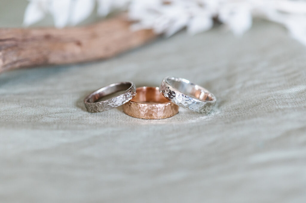 Hammered wedding bands in 18ct white gold, 9ct rose gold, sterling silver