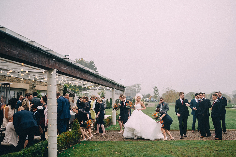 A Yorkshire barn wedding in the brightest shades of Autumn. Photography by Paul Santos.