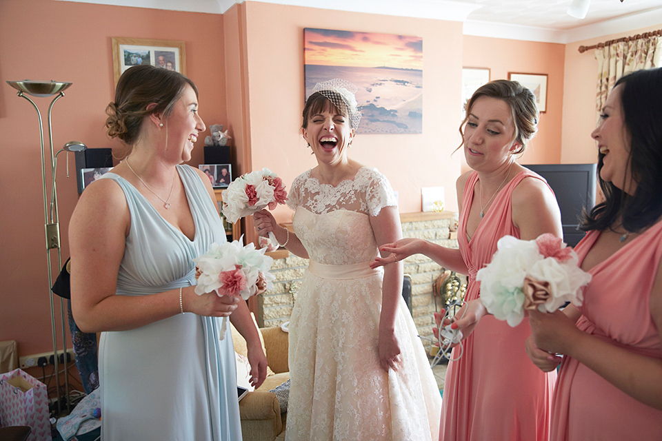 A Short Lace Dress and Fabric Flowers for a Wedding in the Cambridgeshire Countryside. Photography by Natalie J. Weddings Photography.