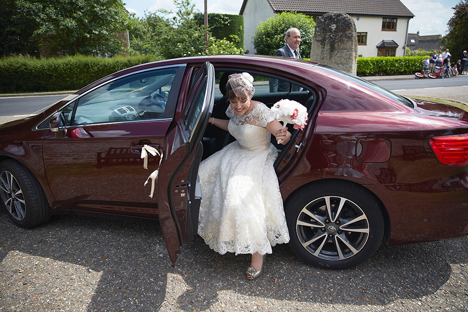 A Short Lace Dress and Fabric Flowers for a Wedding in the Cambridgeshire Countryside. Photography by Natalie J. Weddings Photography.