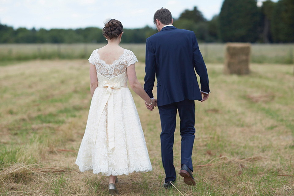 A Short Lace Dress and Fabric Flowers for a Wedding in the Cambridgeshire Countryside. Photography by Natalie J. Weddings Photography.