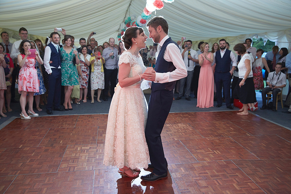 A Short Lace Dress and Fabric Flowers for a Wedding in the Cambridgeshire Countryside. Photography by Natalie J. Weddings Photography.