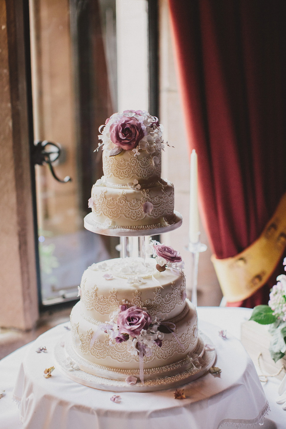 Bride Jenni wears a Watters gown for her wedding at Ellingham Hall in Northumberland. Photography by Awake and Dreaming Weddings.