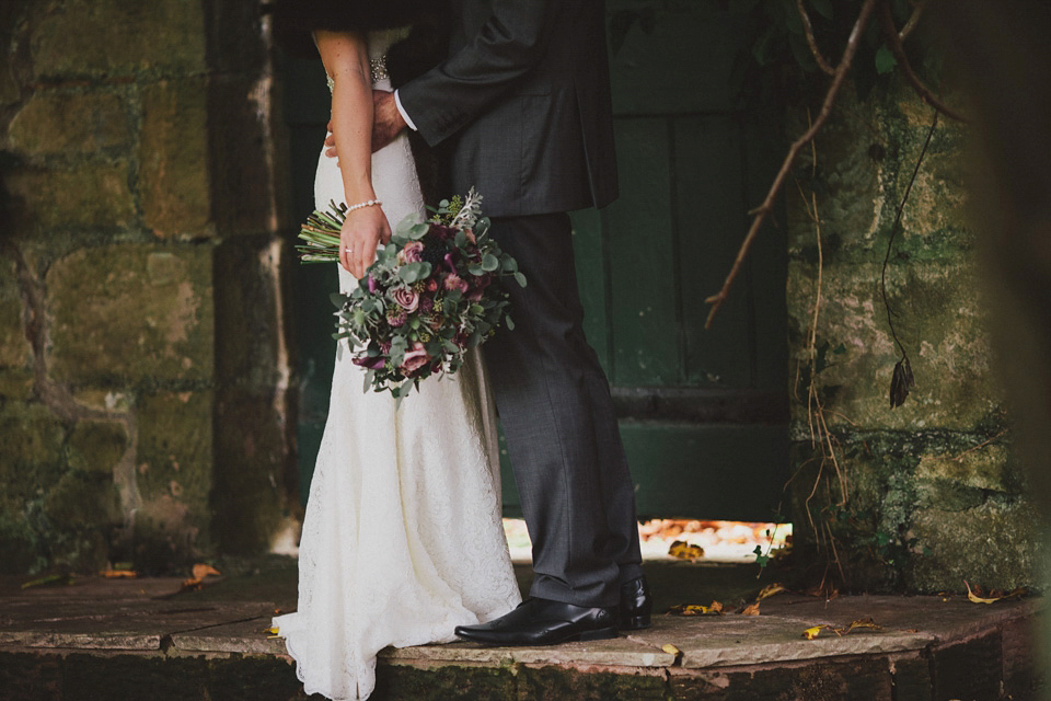 Bride Jenni wears a Watters gown for her wedding at Ellingham Hall in Northumberland. Photography by Awake and Dreaming Weddings.