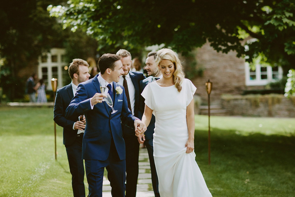 David Fielden elegance for a green and white country garden wedding at Dewsall Court. Fine art film photography by David Jenkins.