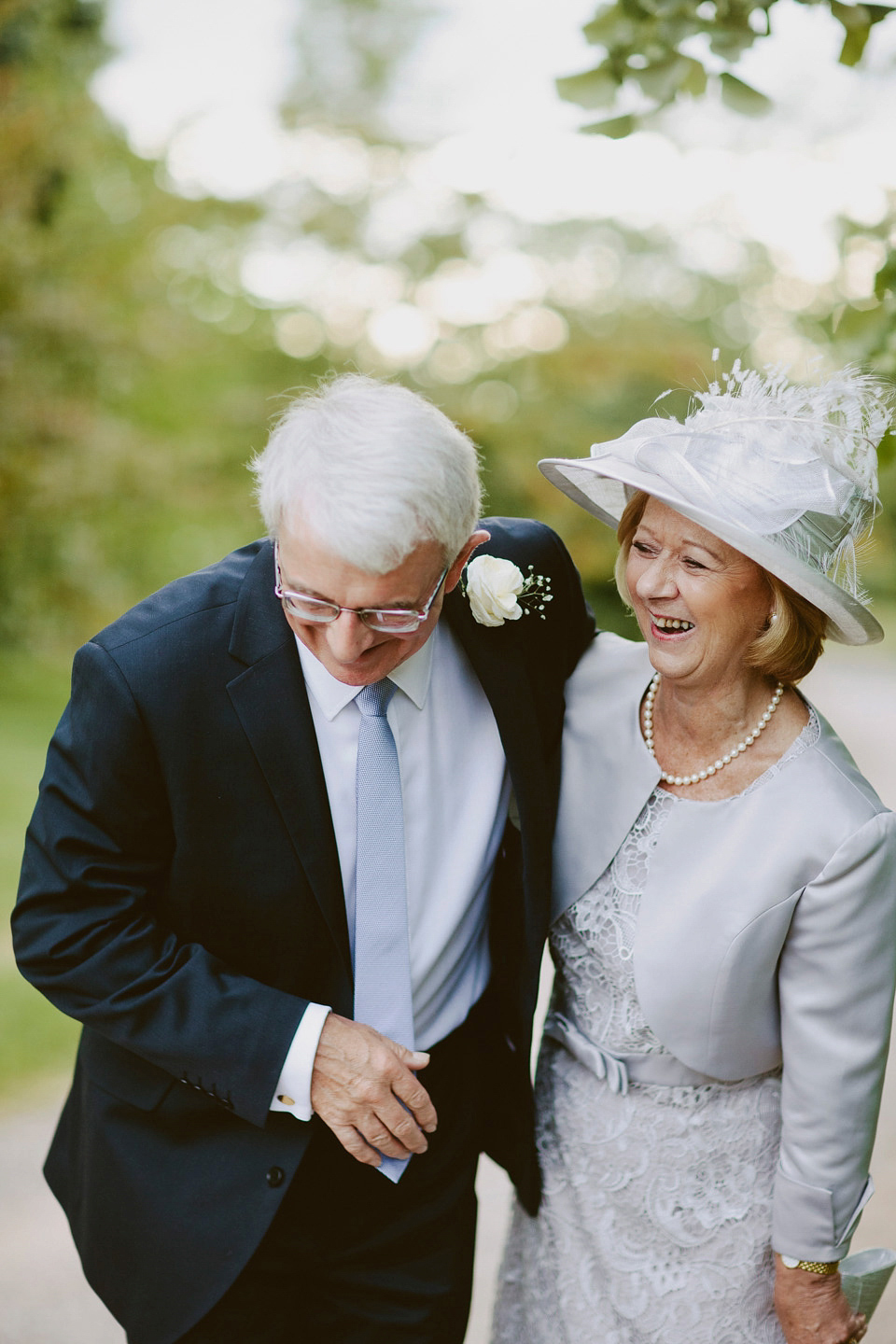 David Fielden elegance for a green and white country garden wedding at Dewsall Court. Fine art film photography by David Jenkins.