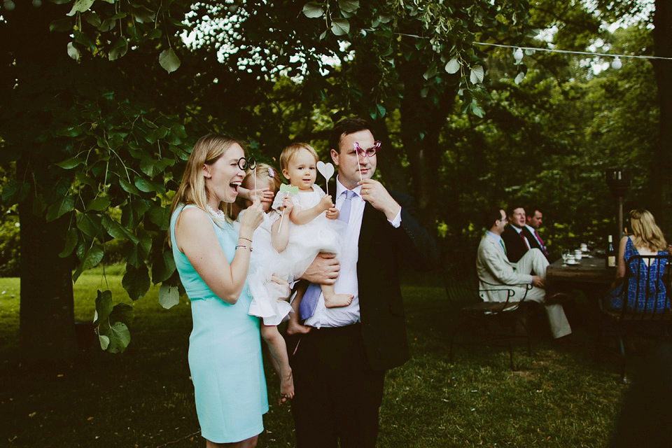 David Fielden elegance for a green and white country garden wedding at Dewsall Court. Fine art film photography by David Jenkins.